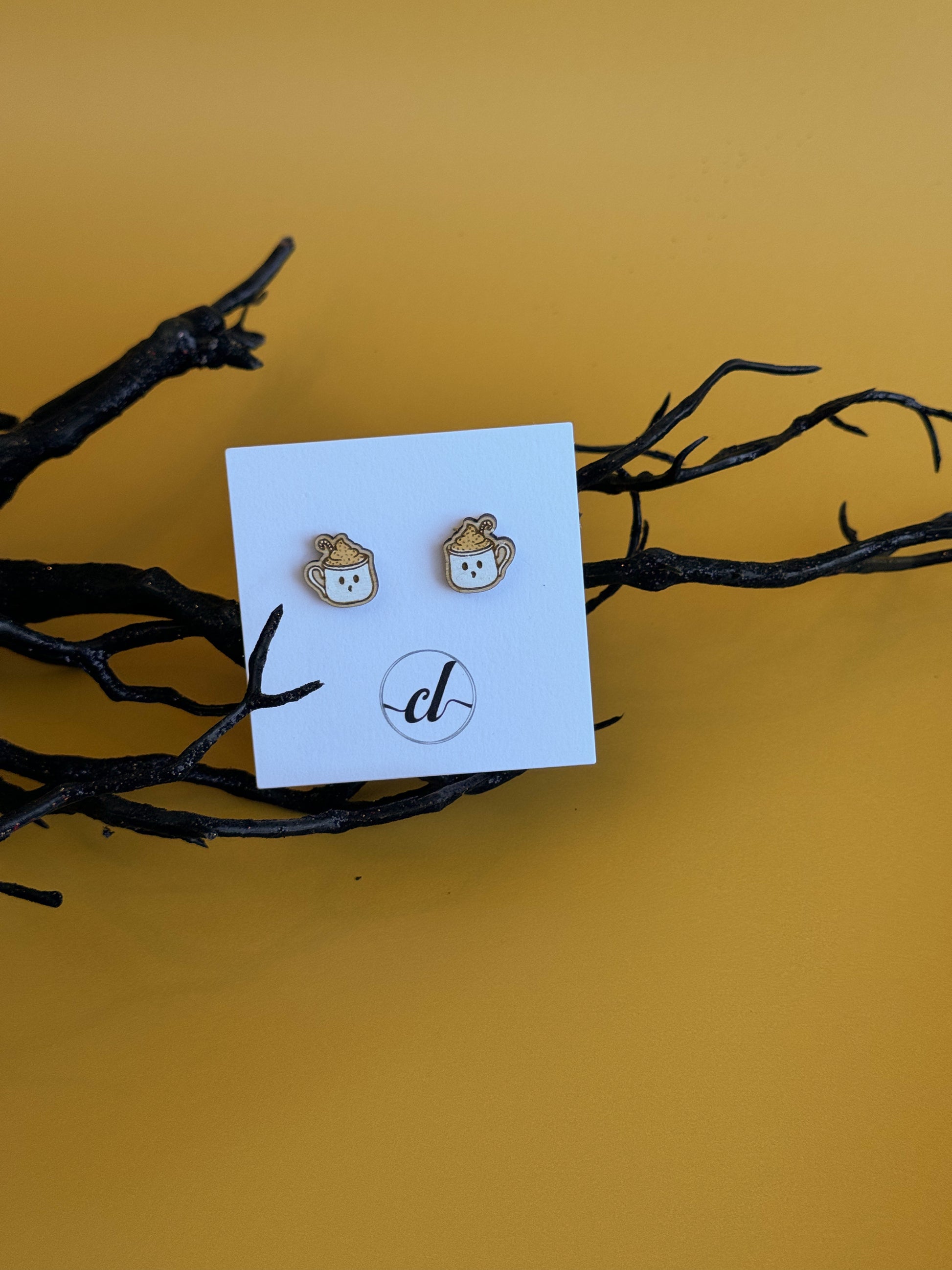 Hand-painted wooden Halloween earrings featuring spooky designs, perfect for fall fashion and Halloween celebrations. Lightweight, eco-friendly, and crafted for a festive touch.