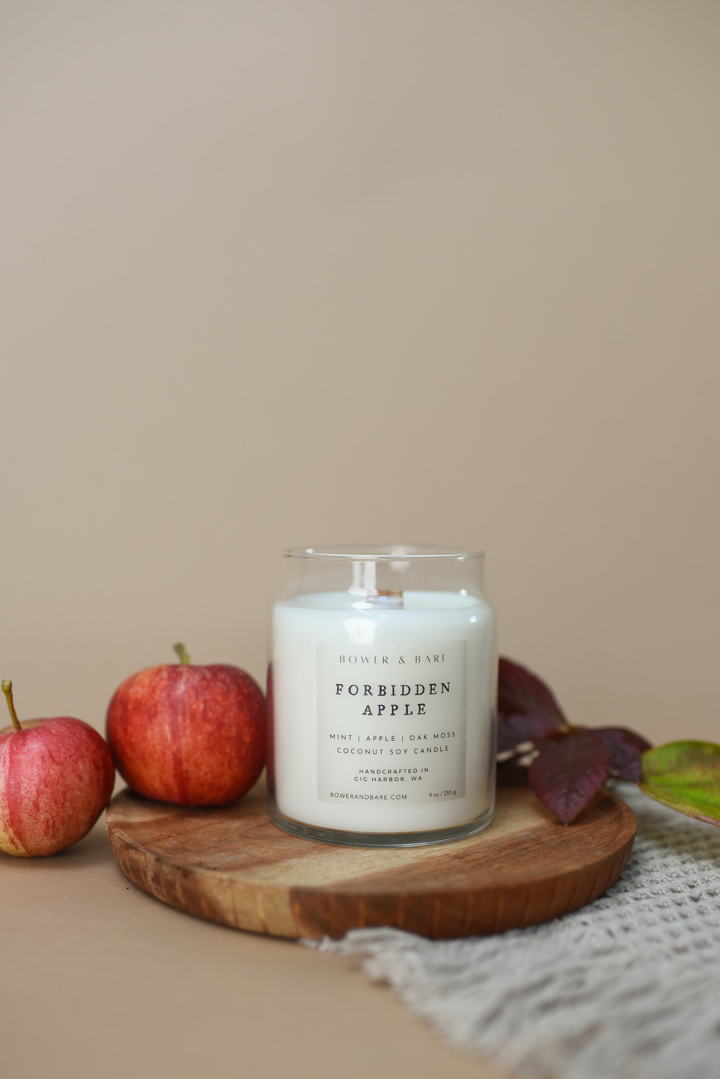 Our Forbidden Apple Apothecary Candle by Bower & Bare brings the intoxicating scent of fresh apples into your home. Hand-poured with eco-friendly soy wax and infused with natural essential oils, this candle is a fall favorite for creating a cozy, inviting atmosphere. Clean-burning and toxin-free, perfect for autumn evenings.